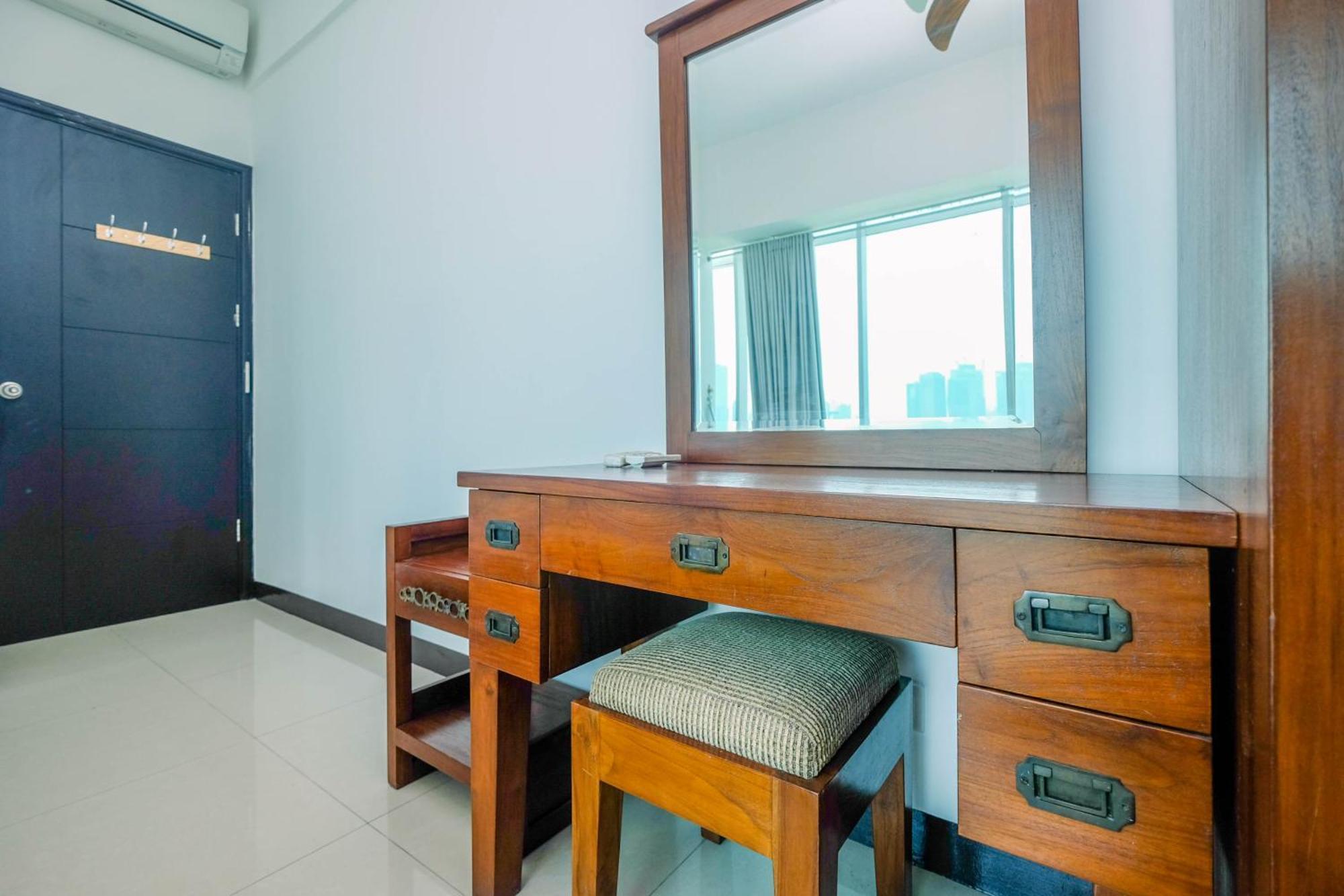 Homey And Warm 1br At Ambassade By Travelio Apartemen Jakarta